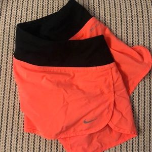 Medium orange Nike running shorts